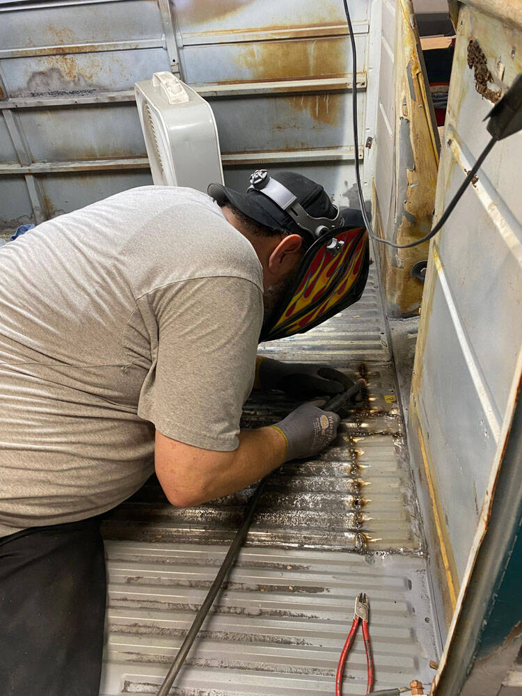 Fred Cordts working on welding parts of the floorboard.