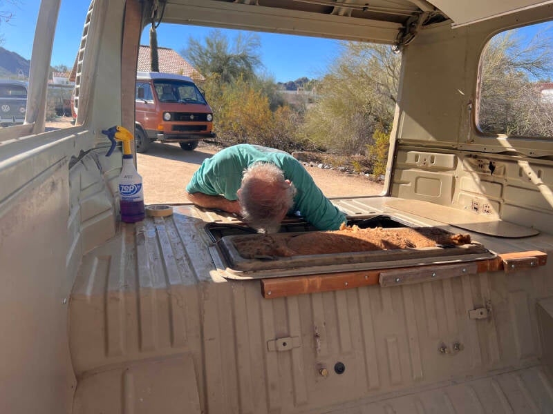 Mark cleaning the engine.