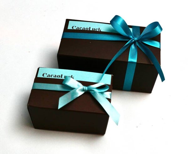 Doosje met pralines puur, melk en wit