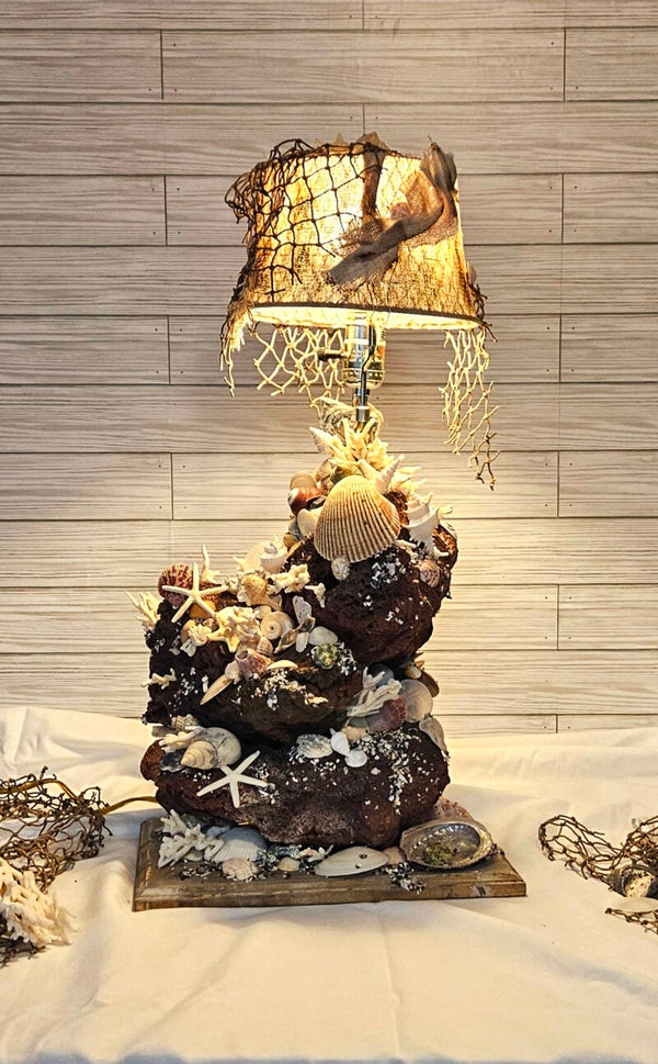 Light of the sea (seashells, light, net, coral, rocks)