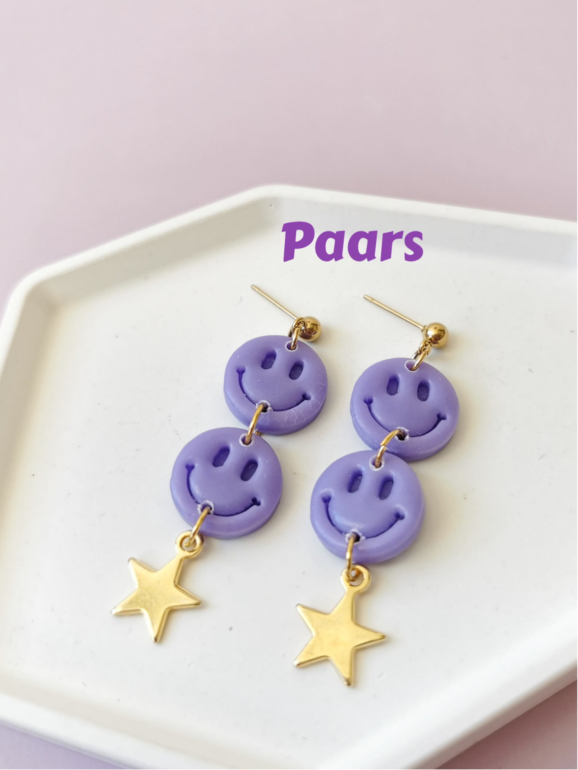 Paarse polymeerklei oorbellen