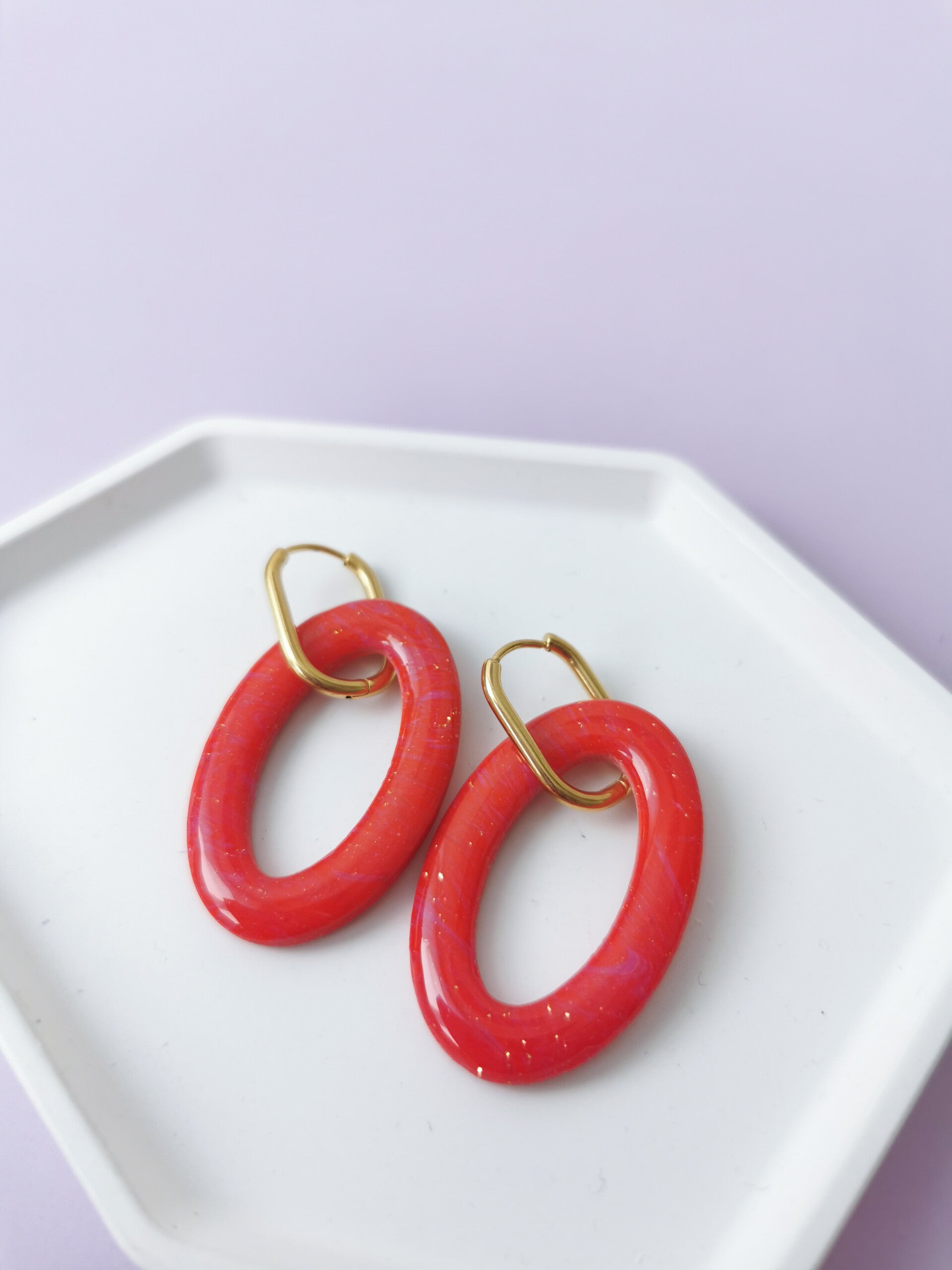 Rood/roze ovale bedels
