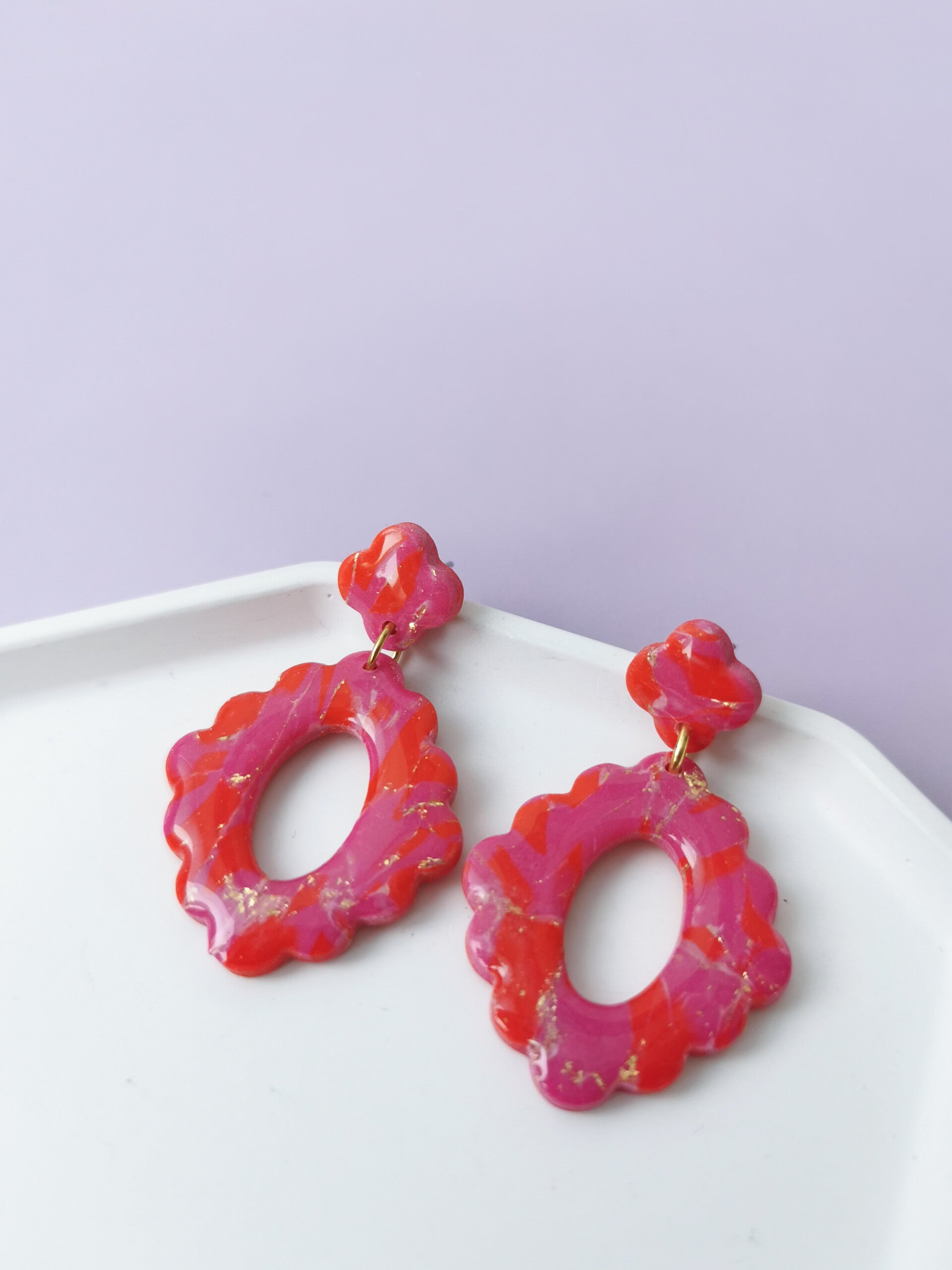 Rood/roze oorbellen