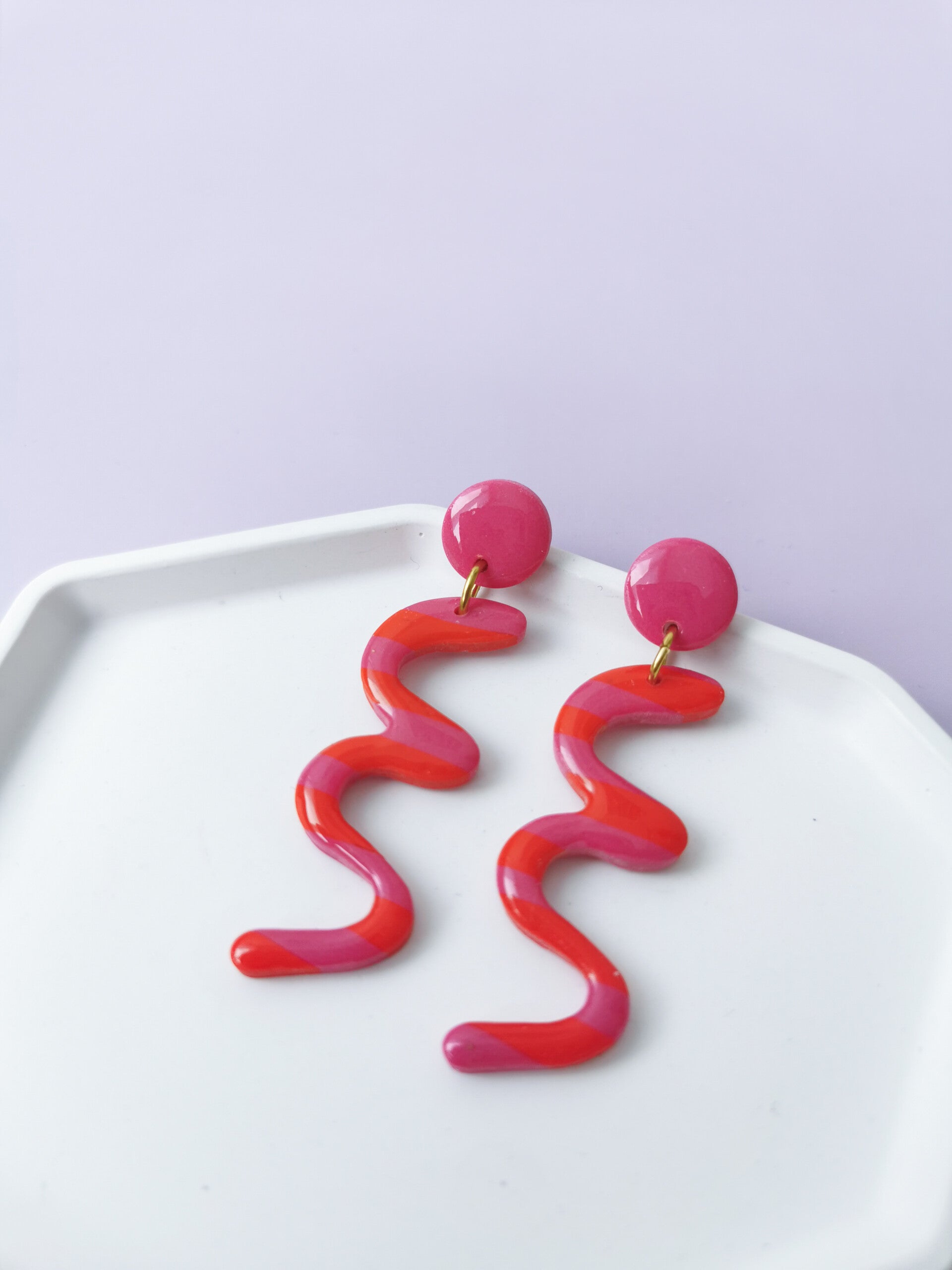 Rood/roze slinger oorbellen
