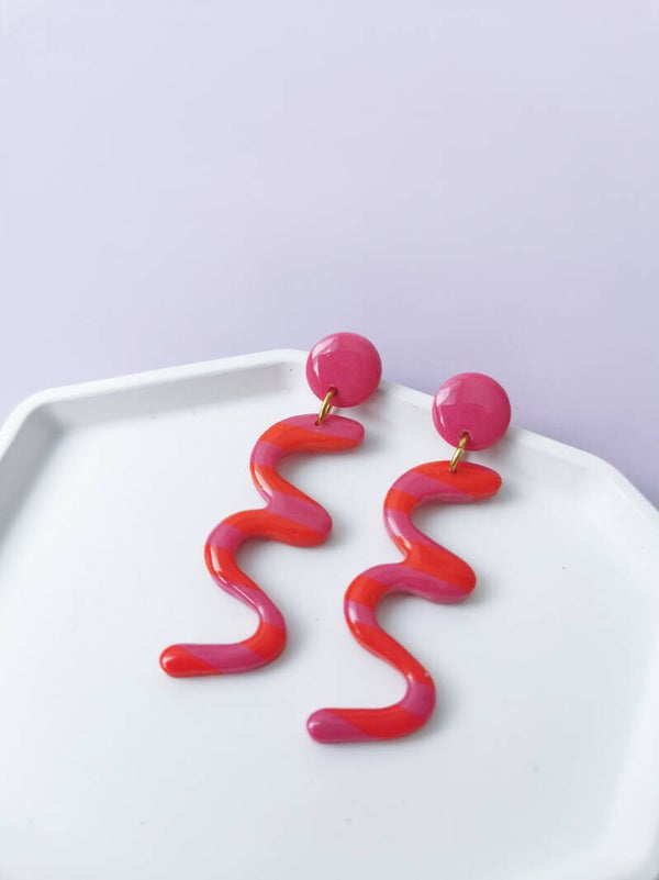 Rood/roze slinger oorbellen