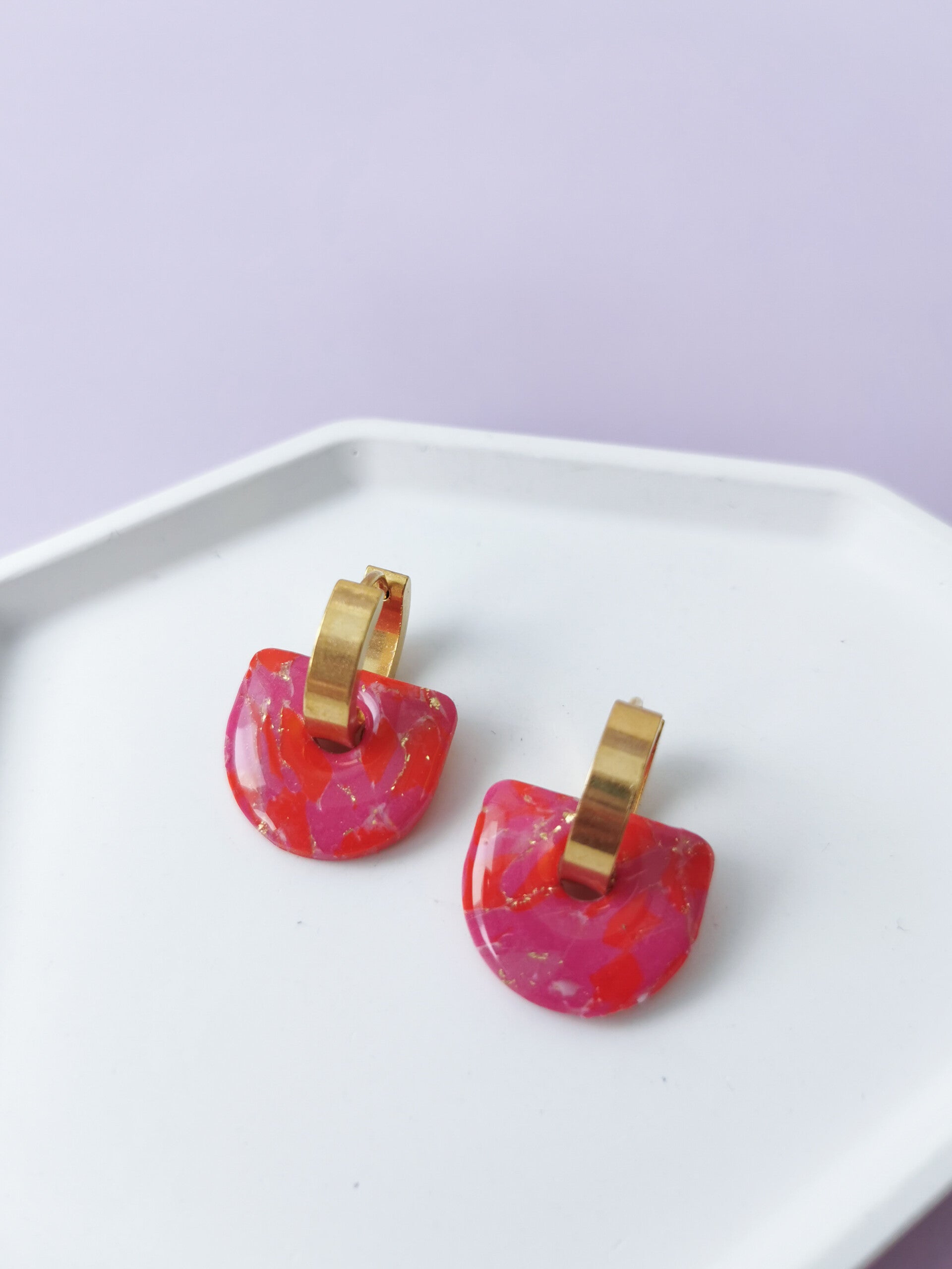 Rood/roze boog bedels