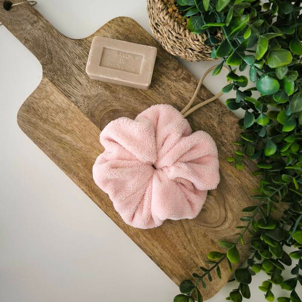 Fleur de douche rose pâle