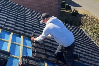 Mr. Vaes op een dak