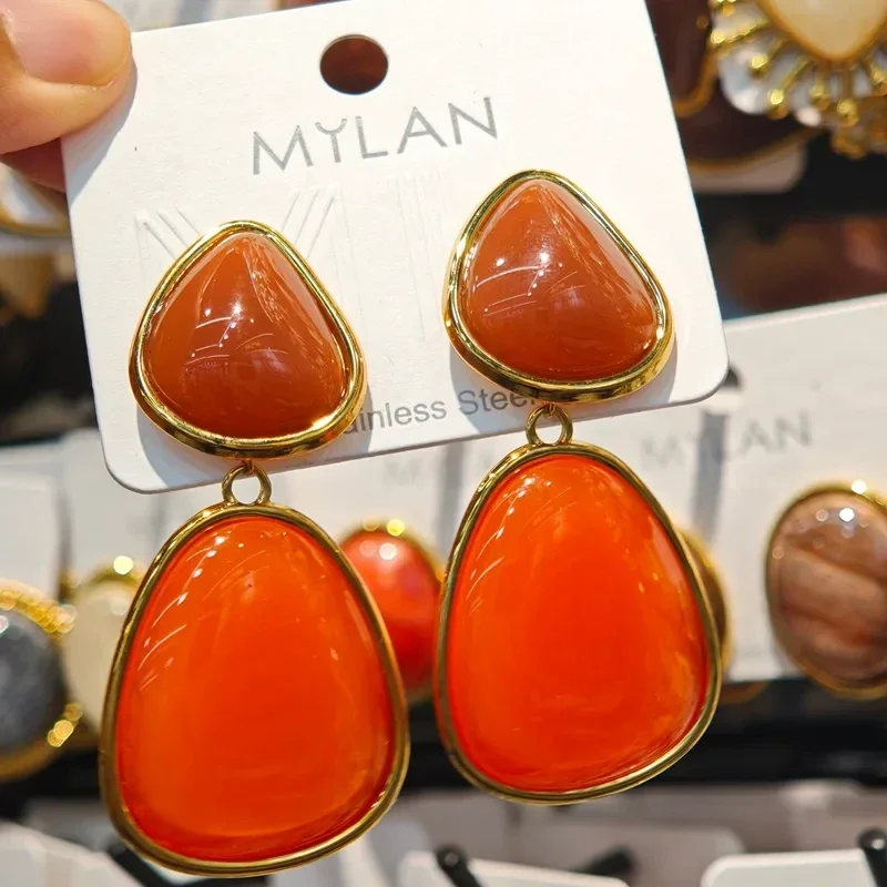 Statement amber/oranje