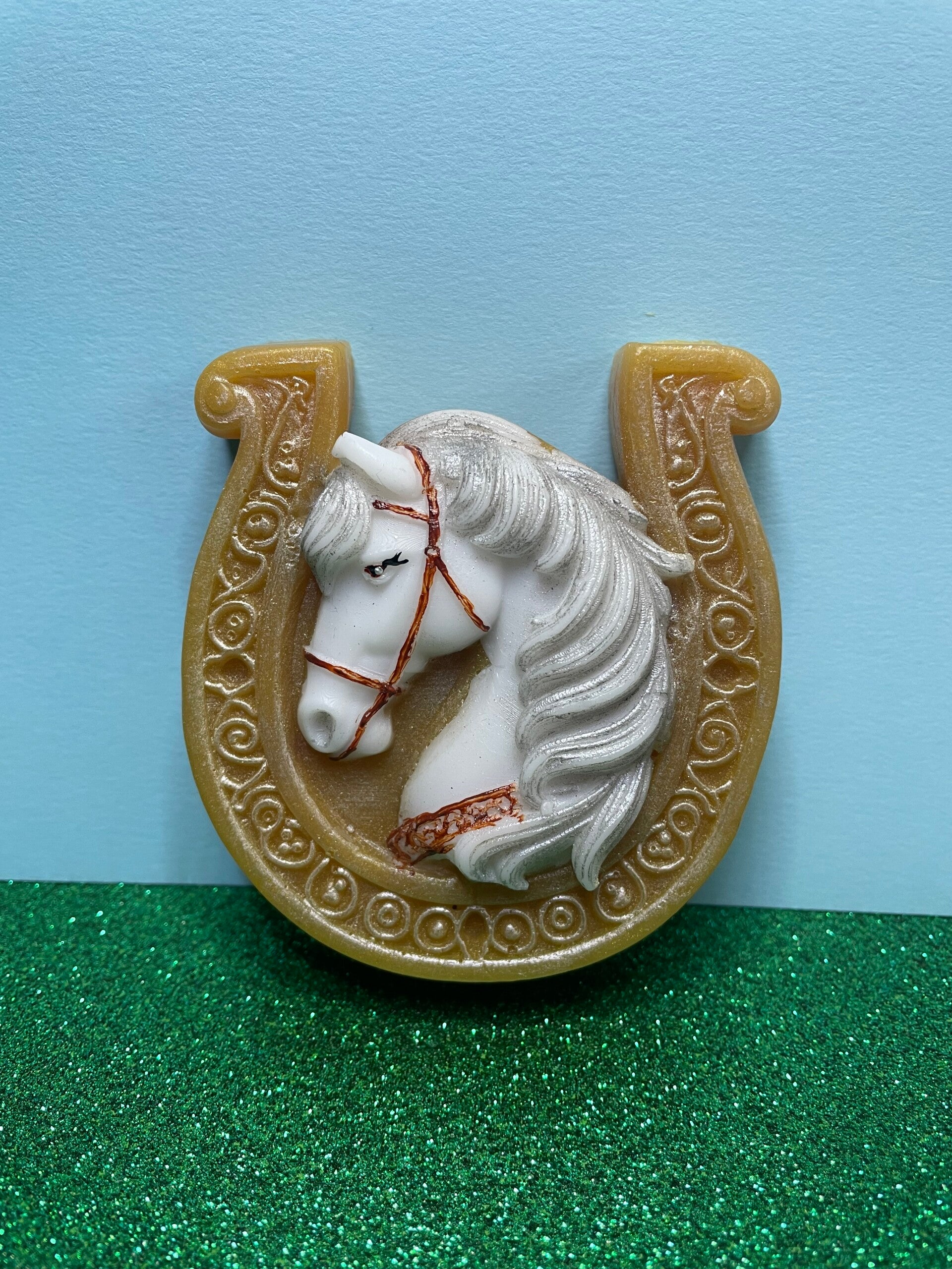 Hufeisen mit Pferd