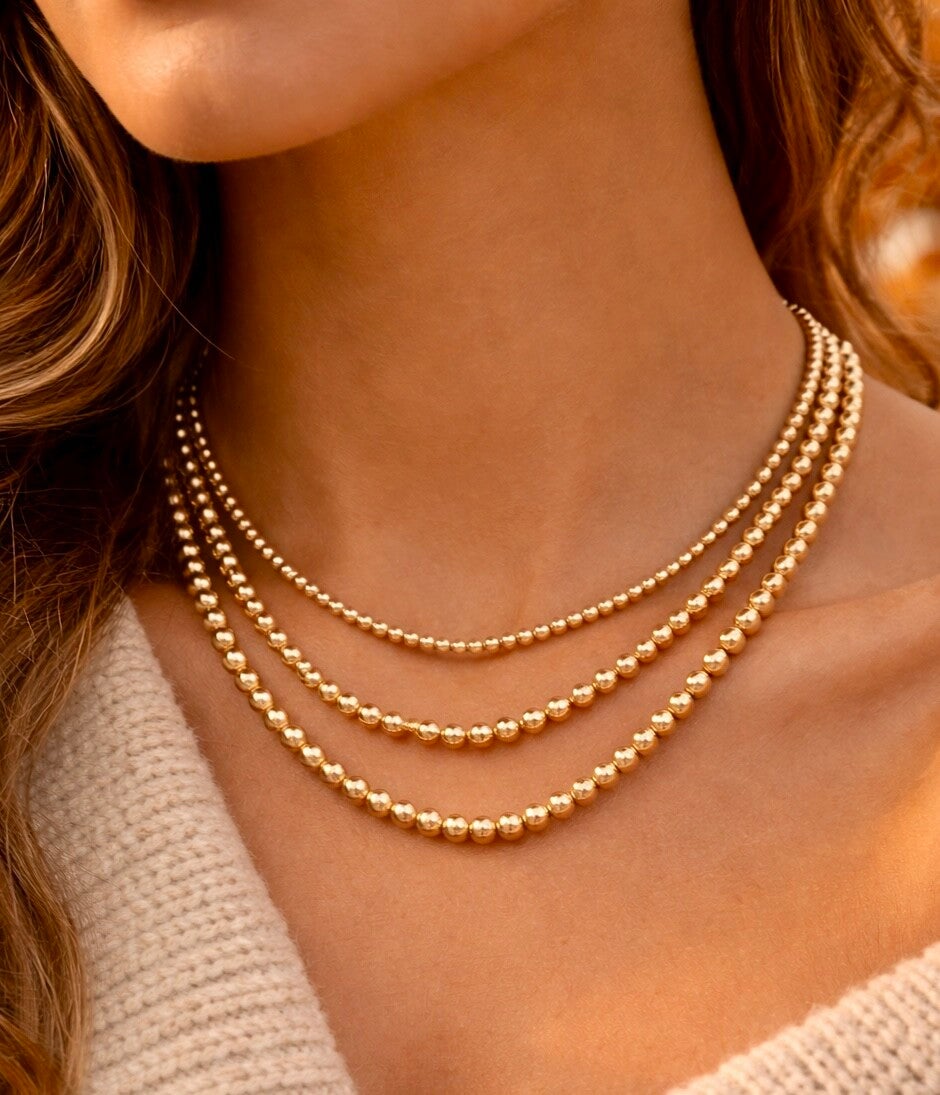 Collar de cuentas dorado 3 piezas