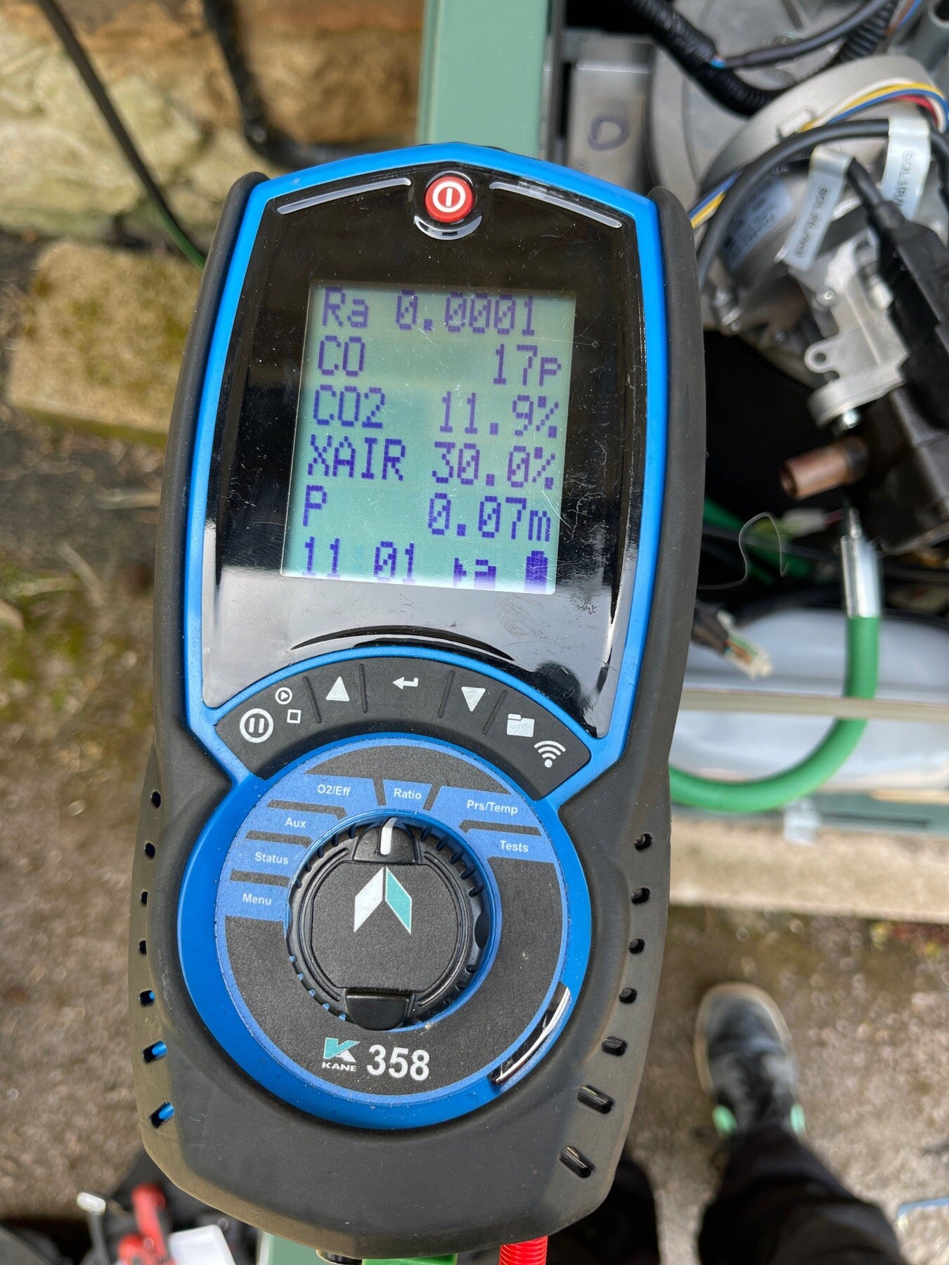 Combustion analyser showing CO2 and carbon monoxide readings after Navien LCB700 service