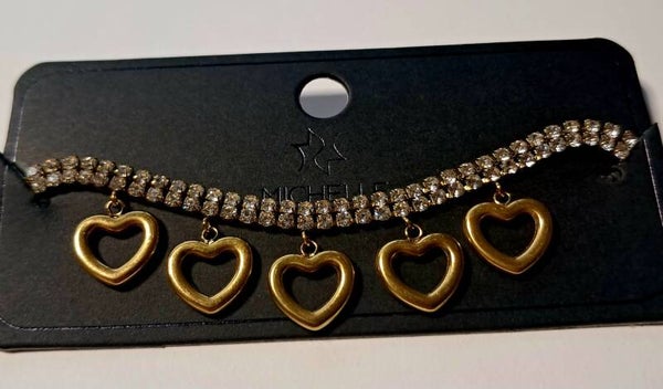 Gouden armband met hartjes en diamantjes