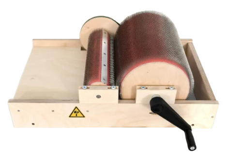 Manual carder used for carding alpaca wool