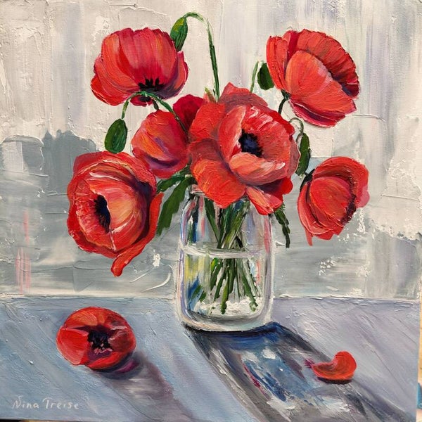 Mohnblumen in einer Glasvase