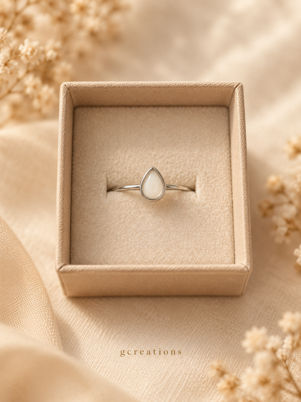 Moedermelkring druppel zilver