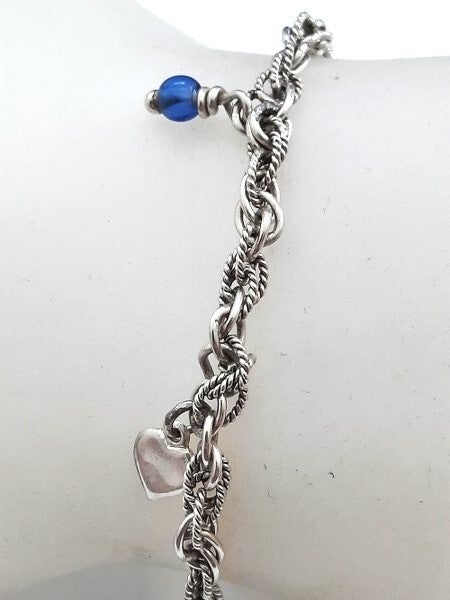 Prachtig zilveren armbandje met vier bedels, 925