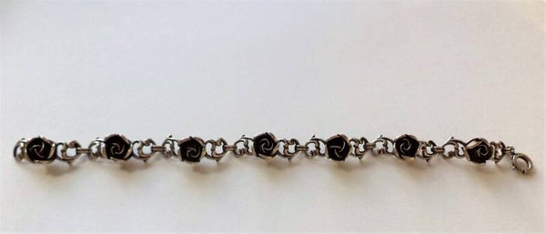 Prachtige zilveren armband met 7 verfijnde rozen - Theodor Klotz Teka