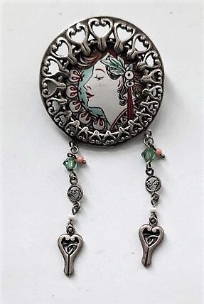 Prachtige zilveren Jugendstil broche met vrouwenkopje, 925