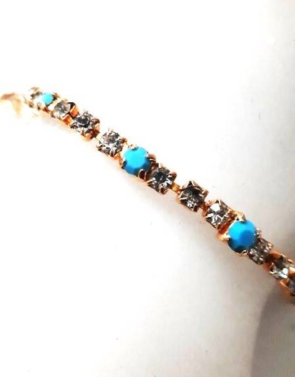 Schitterende Goudkleurige Tennisarmband met Turquoise & Kristallen