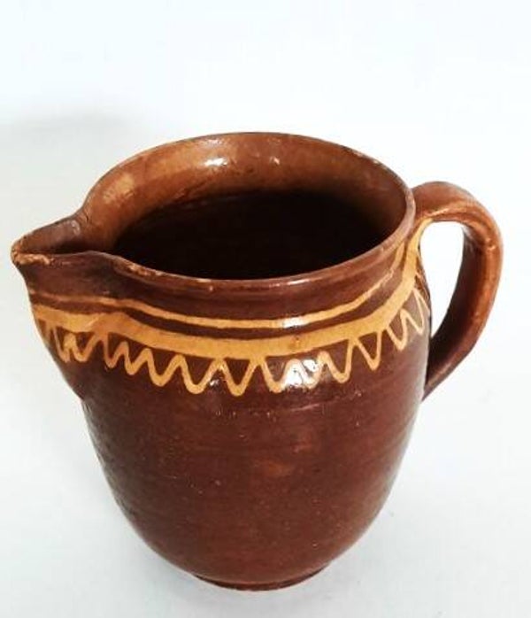 Vintage terracotta kan met ringeloor motief, R