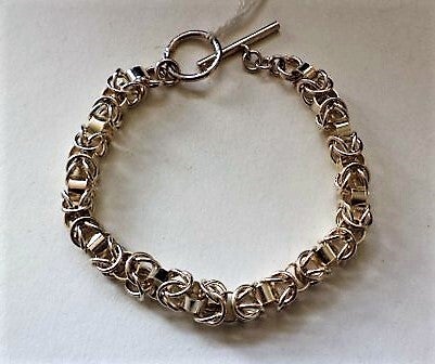 Sterling zilveren armband ringetjes en brede tussenringetjes