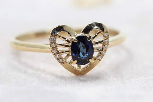 Prachtige 18k gouden ring met blauwe saffier en diamant (25)
