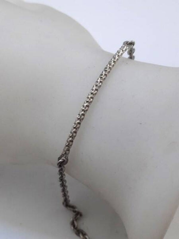 Aparte zilveren armband met koord tussenstuk (7194-455)