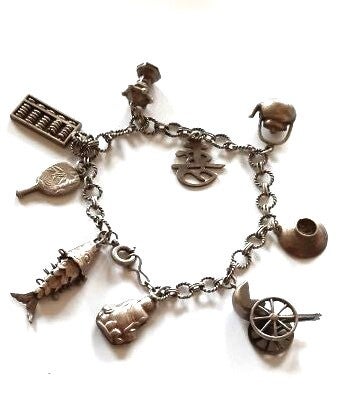 Japanse zilveren bedelarmband met 9 bedels (8062)