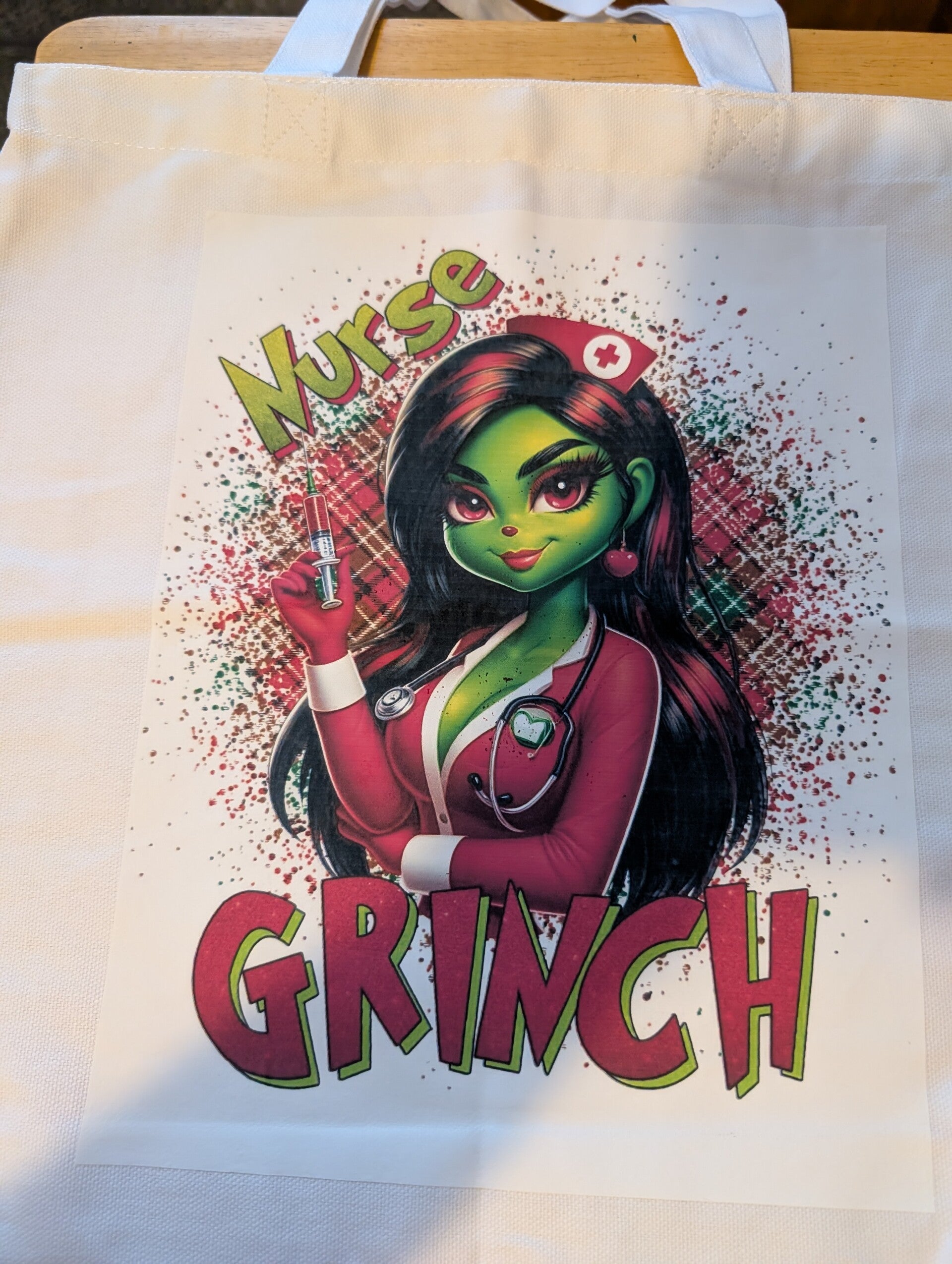 Nurse Grinch tote bag