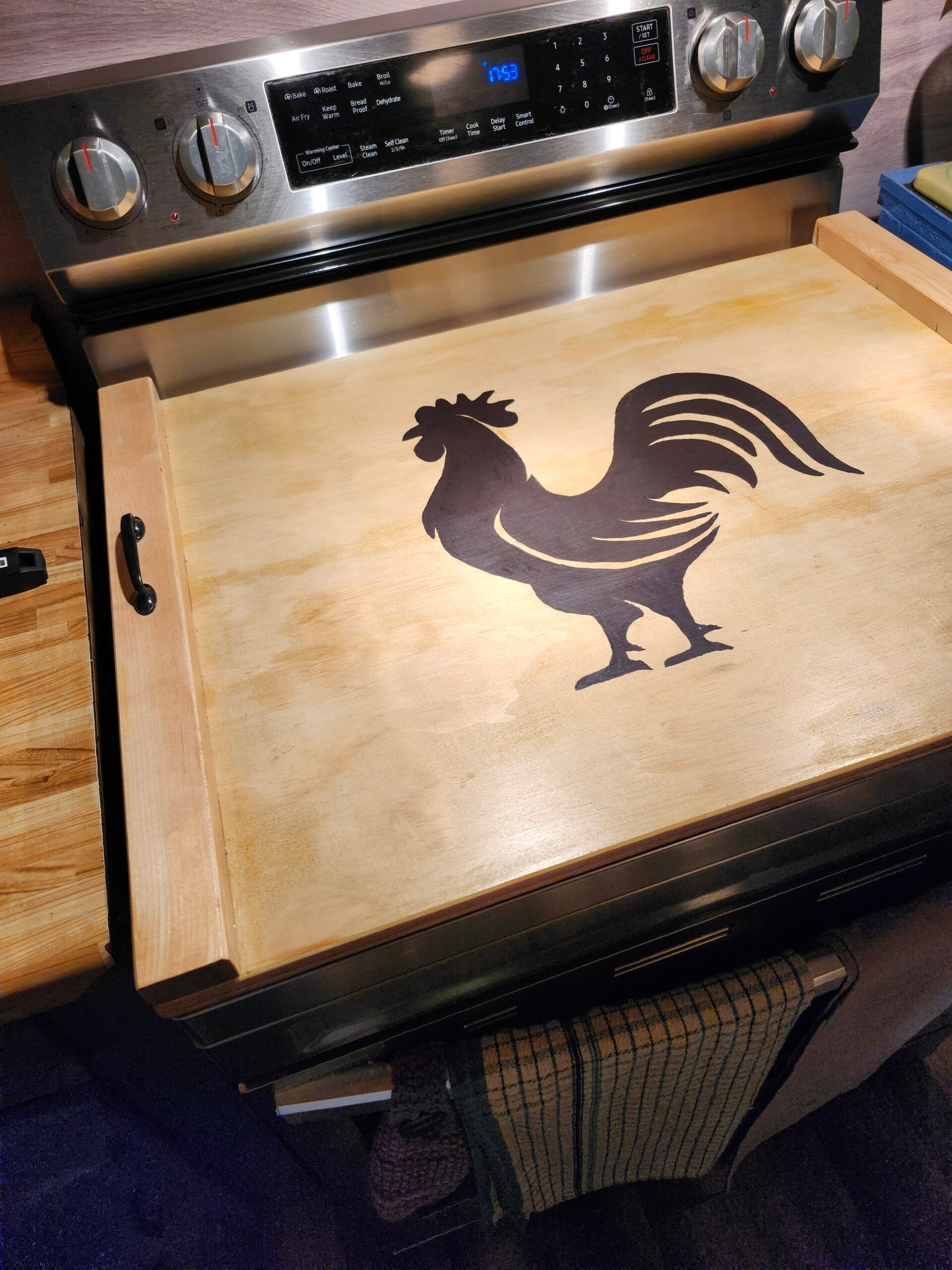 Protège plaque de dessus de poêle