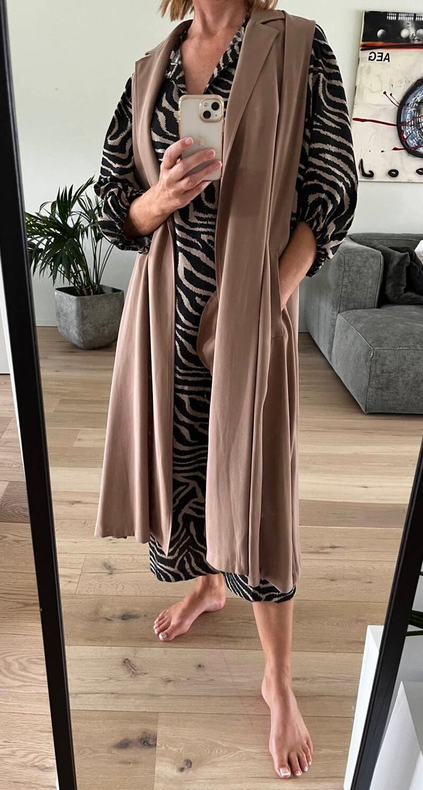 Mouwloze trench coat