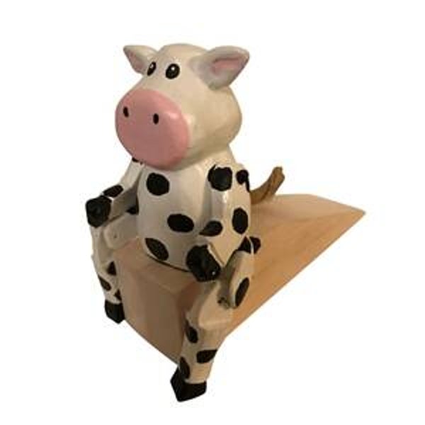 Dangle leg cow door wedge