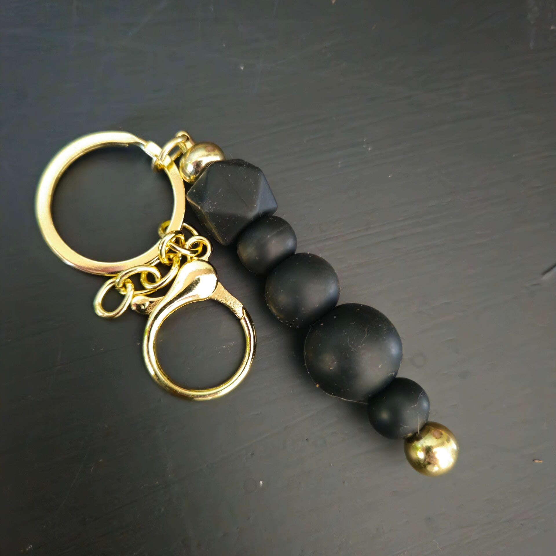 Sleutelhanger, zwart goud