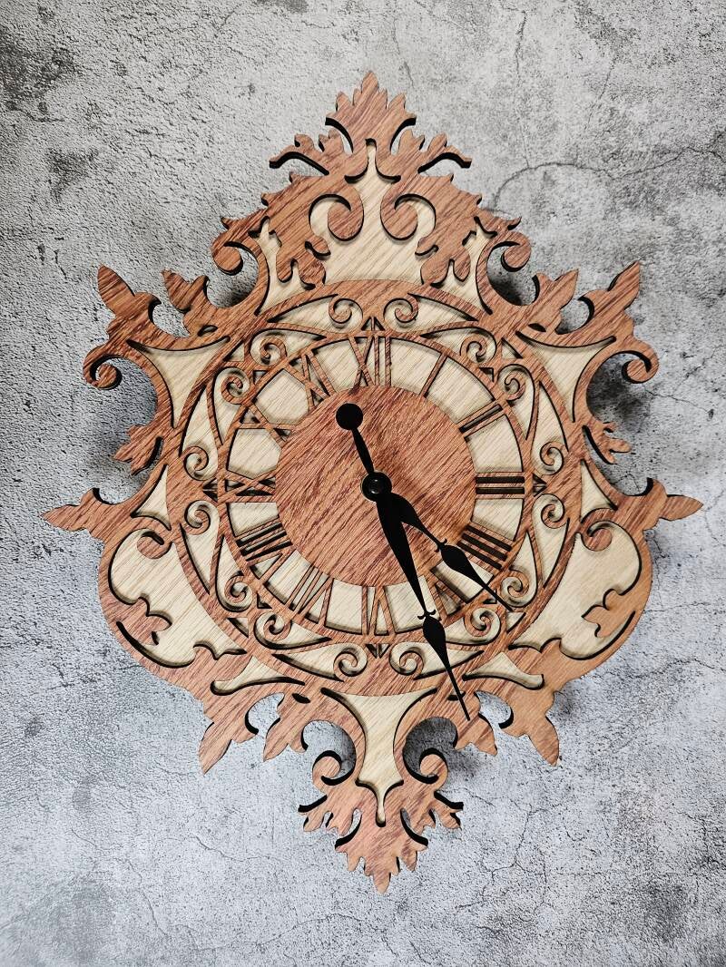 Laser cut clocks with various character designs and colours