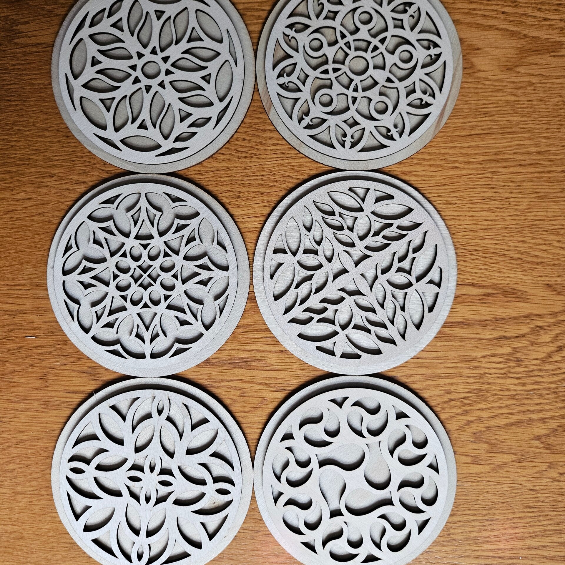 Laser cut clocks in various designs and colours