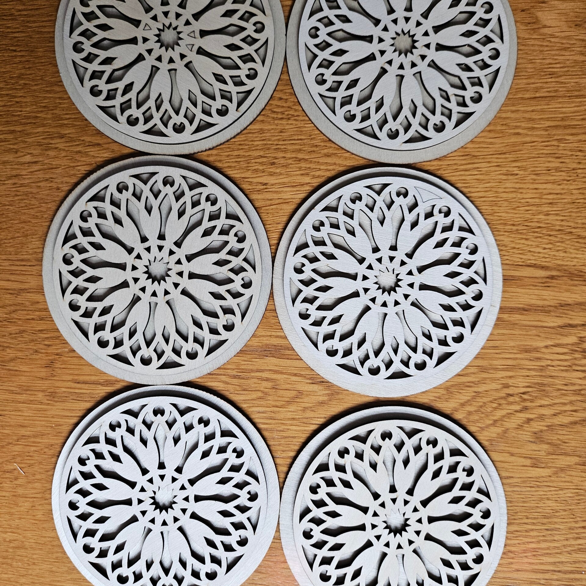 Laser cut clocks in various designs and colours