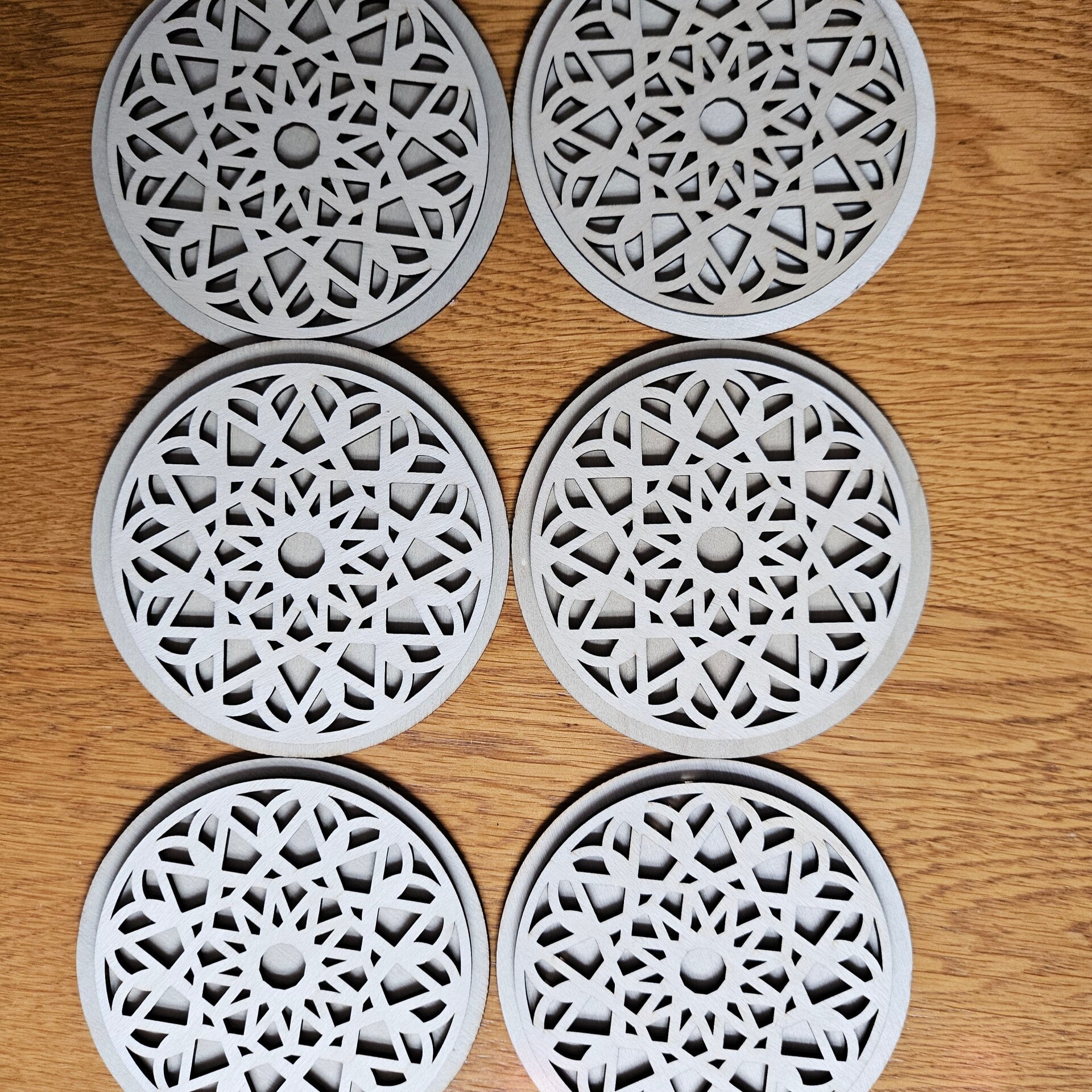 Laser cut clocks in various designs and colours