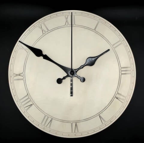 Laser cut clocks in various designs and colours