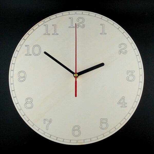 Laser cut clocks in various designs and colours