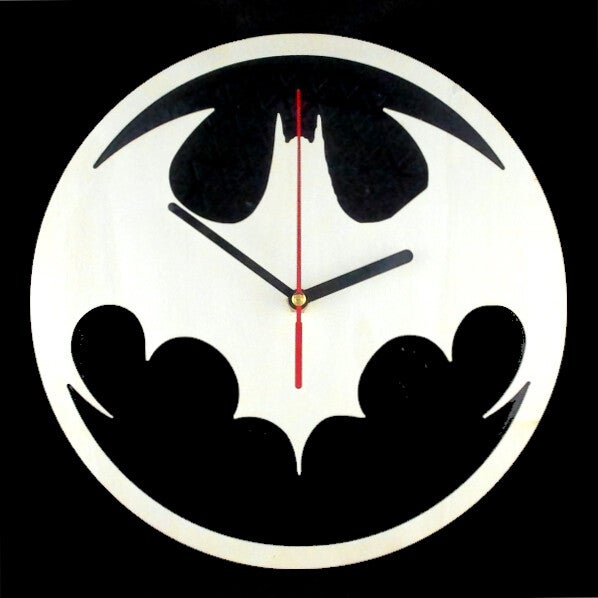 Laser cut clocks with various character designs and colours