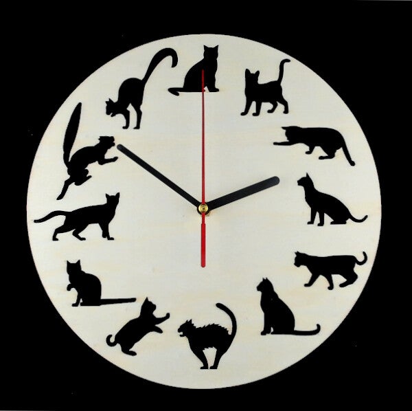 Laser cut clocks with various character designs and colours