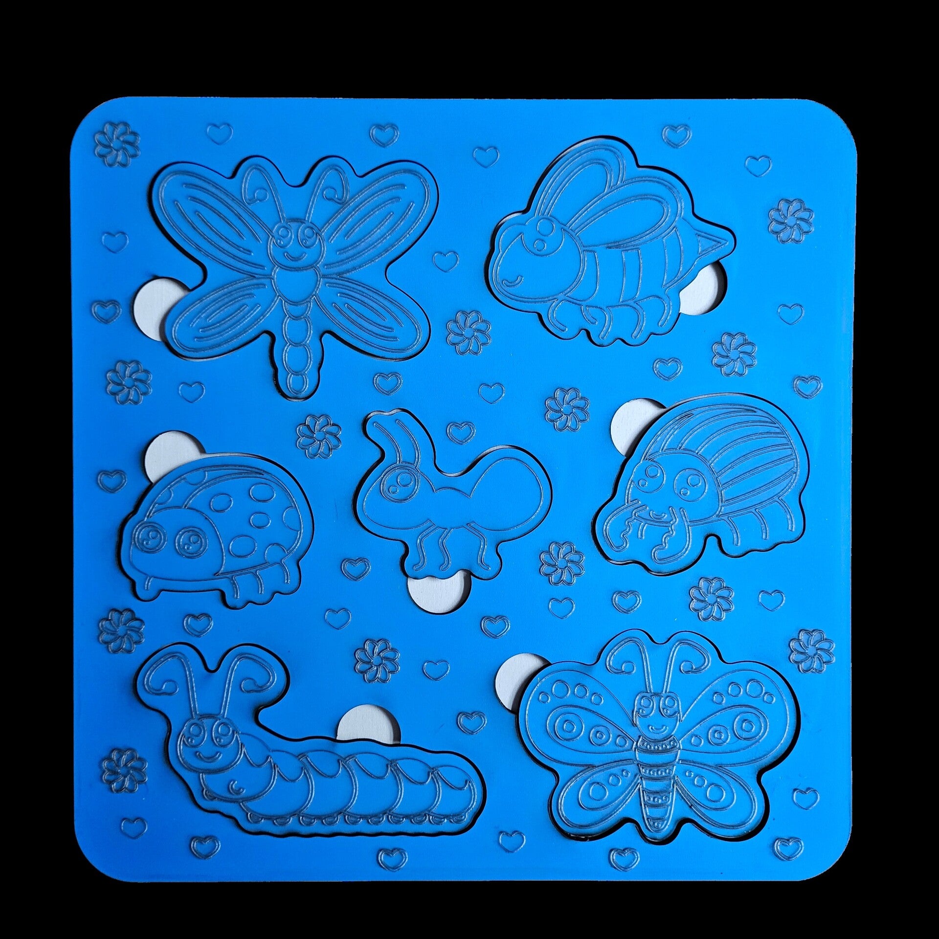 Laser cut toys, games and puzzles with various character designs and colours