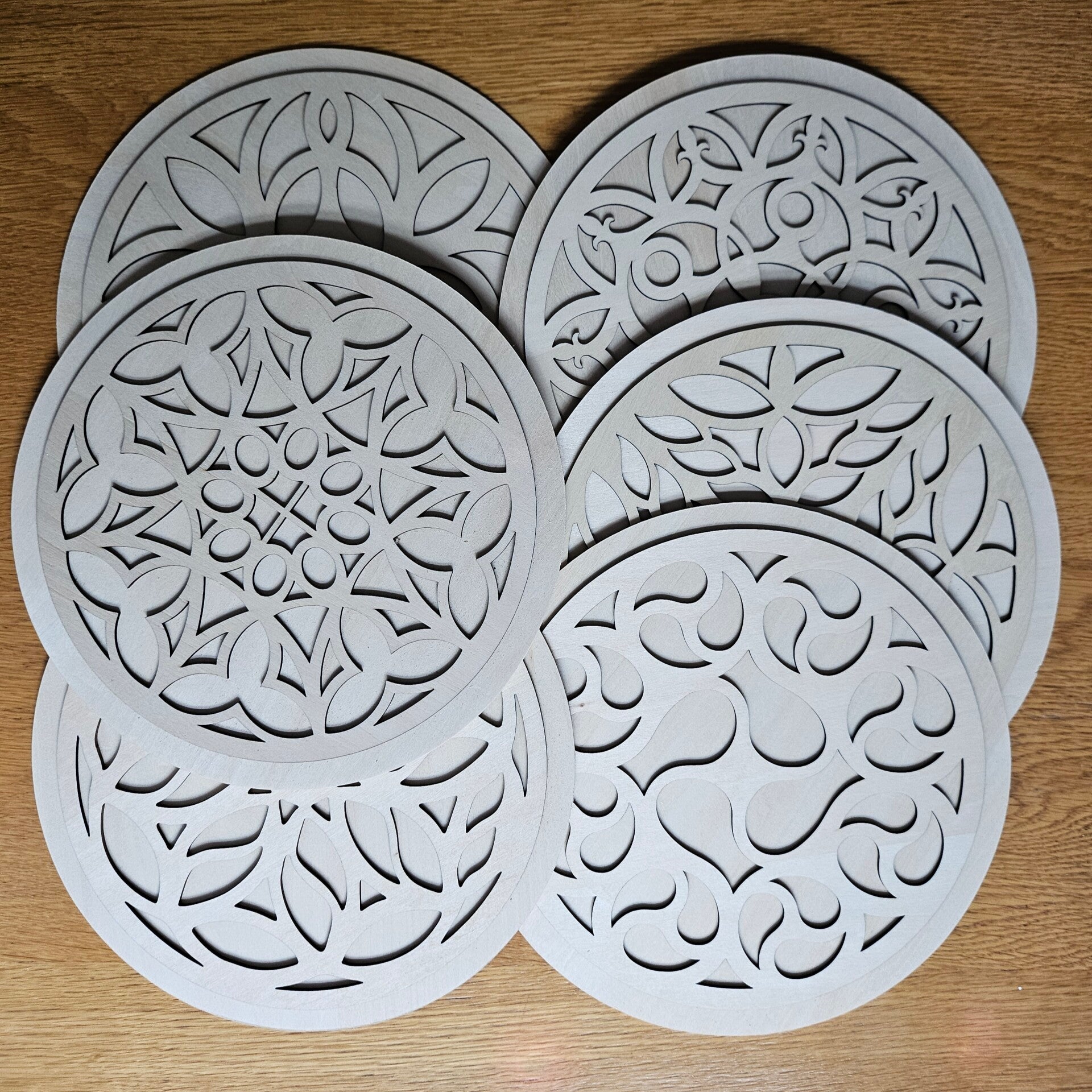 Laser cut clocks in various designs and colours