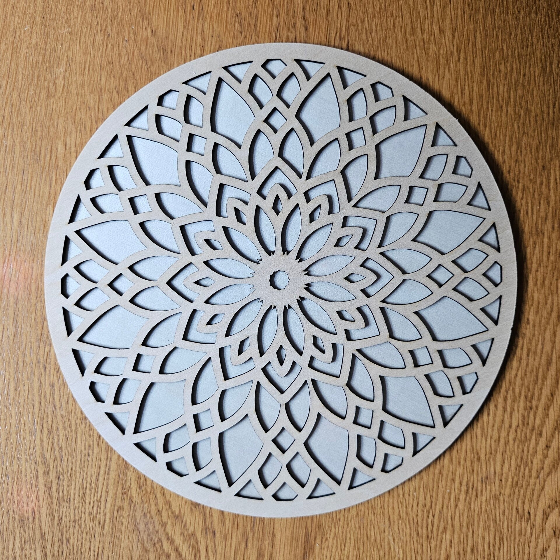 Laser cut clocks in various designs and colours