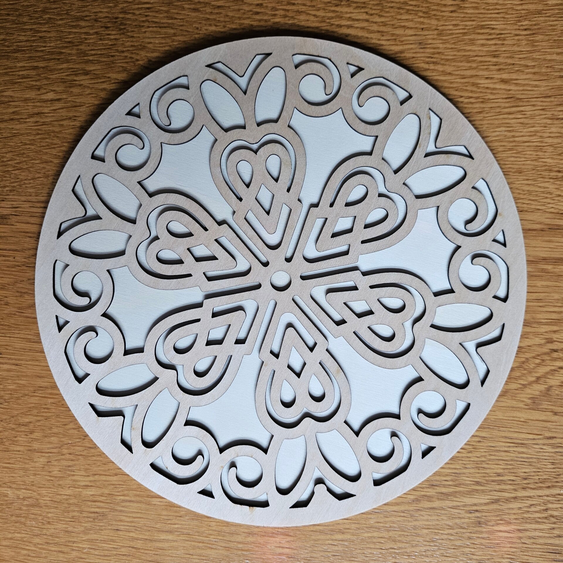 Laser cut clocks in various designs and colours