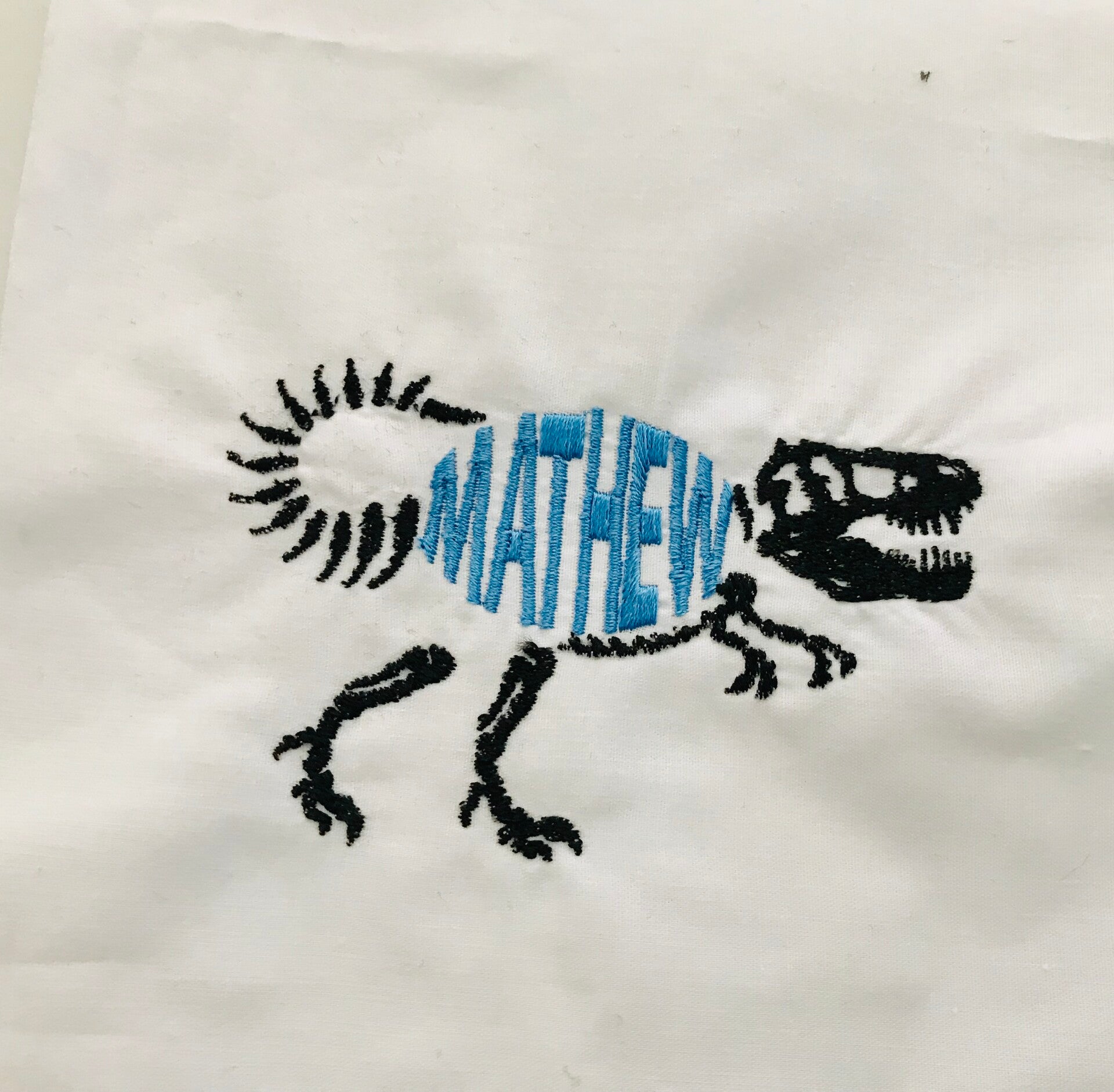Custom T-Rex Skeleton Name Embroidery Design
