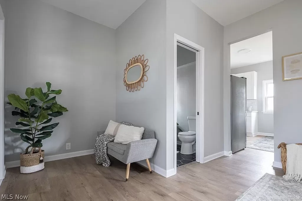 Luxury vinyl plank flooring installation, featuring a realistic wood look with waterproof durability