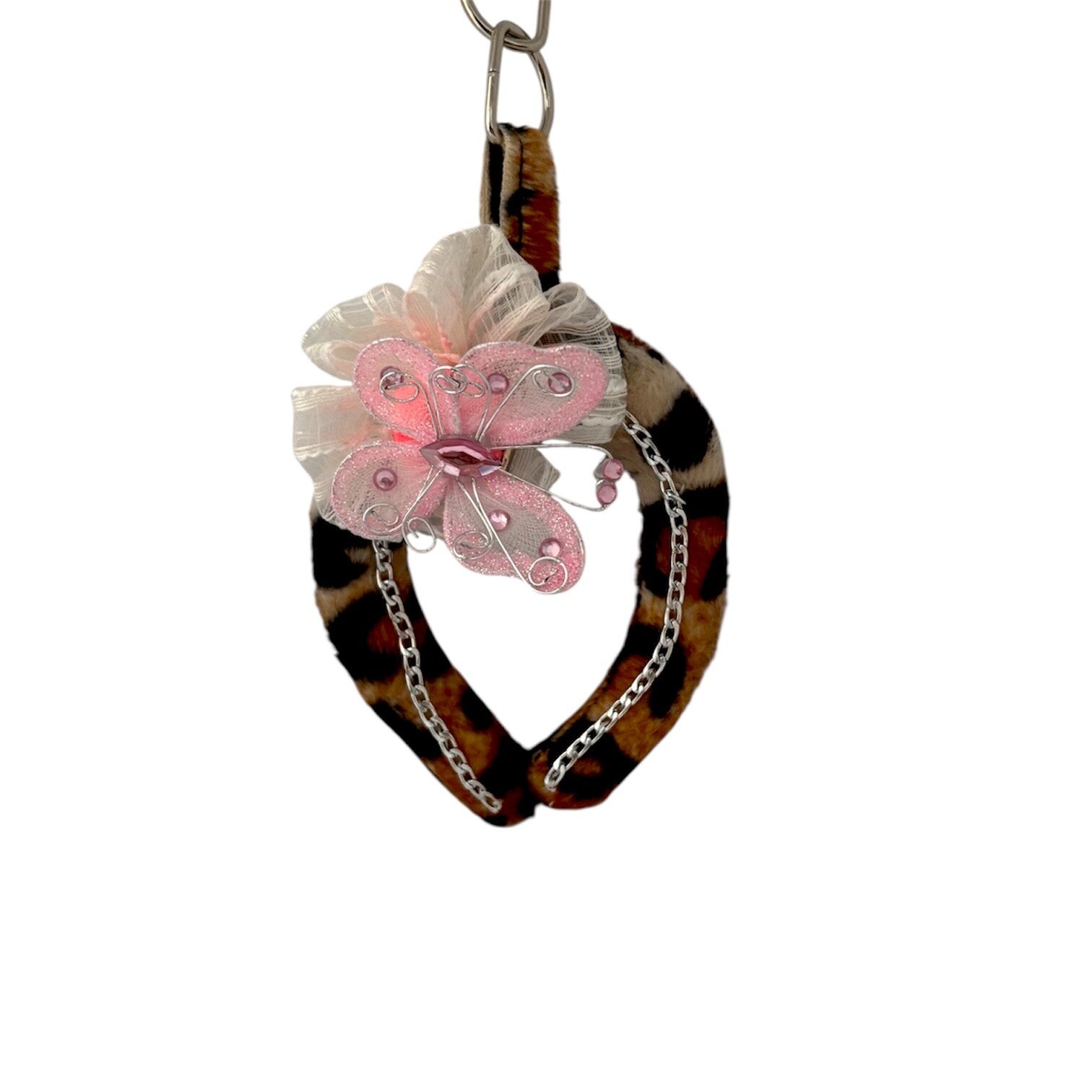 Pantteri/vaaleanpunainen perhonen