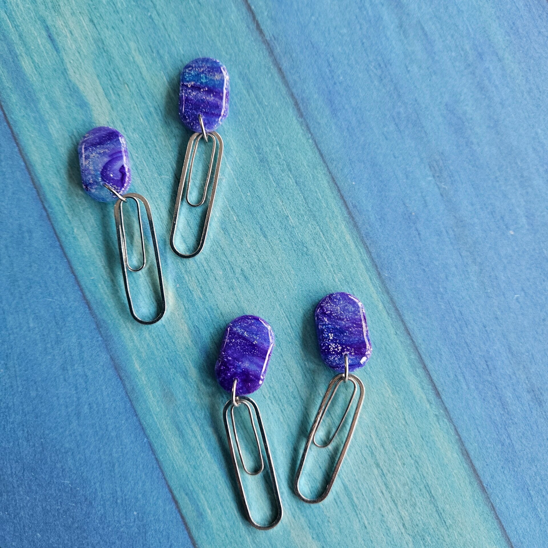 Lange oorhangers met ovalen studs en dubbele ovalen bedels - art nouveau (model Karo) - 2 versies(PMK Nungwi-twilight) (RVS)